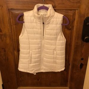 White puffy vest